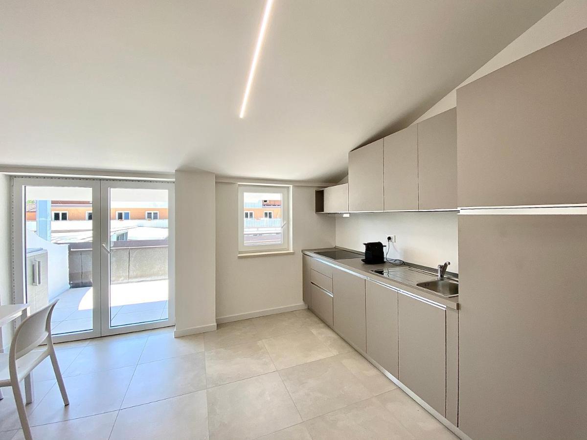 Em Apartments Lignano Sabbiadoro Extérieur photo